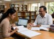 PhD assistance near me: a research consultant reviewing a thesis chapter with a doctoral scholar